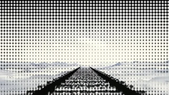 A digital halftone pattern overlays a view of a distant mountain landscape scene
