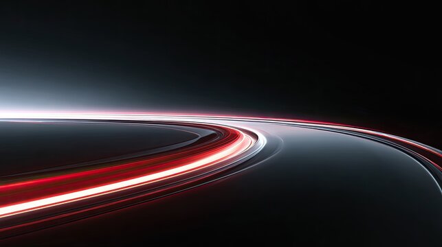 Abstract light trails curving across a dark, reflective surface