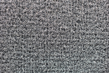 Fototapeta premium Rough, gray fibrous surface up close.