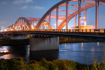 Fototapeta premium 丸子橋と多摩川の夜景 Night View of Maruko Bridge Over the Tama River, Japan