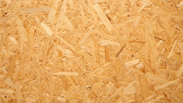 Close-up of Oriented Strand Board Texture, natural wood panel background