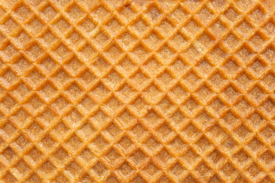 crunchy golden brown waffle wafer pattern texture background