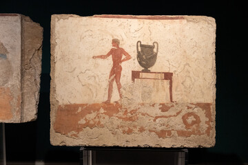 Paestum, Italy - 16 Feb 25: Tomb Fresco with Figure and Krater at Museo Archeologico di Paestum © Joseph Creamer