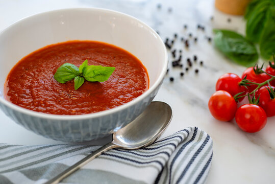 Tomato soup with basil made with fresh tomatoes