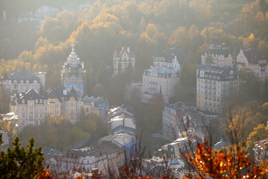 Autumn view of Karlovy Vary with Church of St. Mary Magdalene above Tepla River, Czech Republic. g.