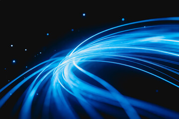 Obraz premium Dynamic swirling blue light streams against a dark background, evoking digital tech and energy concepts.