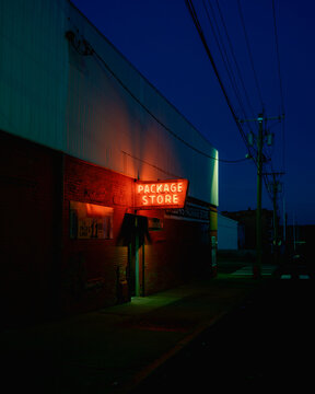 Dillons Package Store vintage neon sign at night, Holyoke, Massachusetts