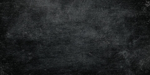 Fototapeta premium Dark gray wall scratched and distressed texture background with vintage grunge effect for design and decoration