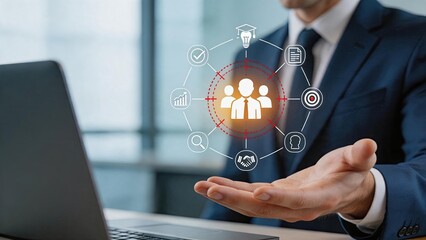 Naklejka premium Businessman holding hologram of team management icons, digital strategy concept, corporate leadership and human resources planning with technology.