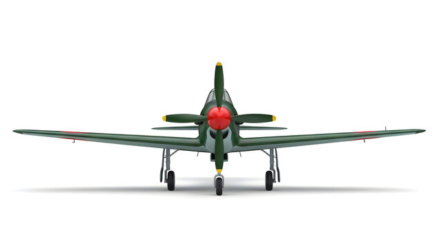 A green military airplane faces forward on a runway at dawn.
