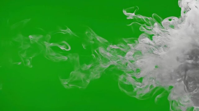 Smoke swirls around a dark center on a green background