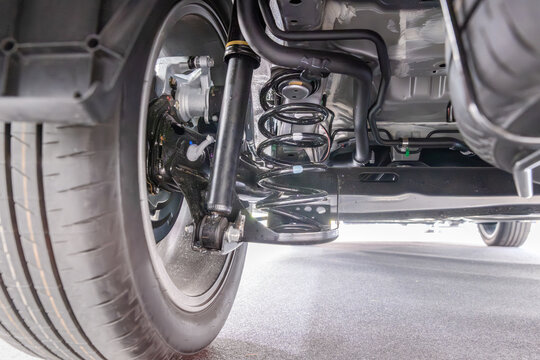 MPV hybrid car suspension and rear axle.