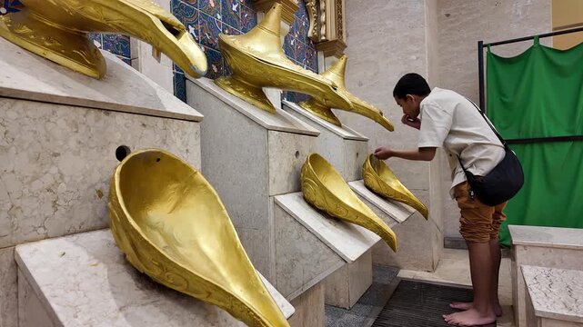 Muslim Boy Performing Wudu Ablution at Mosque Decorative Gold Fountains