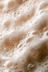 Fototapeta premium Captivating Close-Up of Lathering Bubbles Creating Soft Creamy Texture