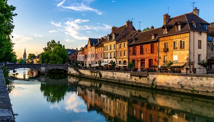 Obraz premium Colorful Historic Houses Lining Calm Canal in Charming Old Town
