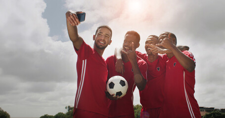 Friends, selfie and men with smile, soccer field and celebration after training routine and fitness. Athlete, memory and happy people with ball, photography and picture with team on break outdoor © peopleimages.com