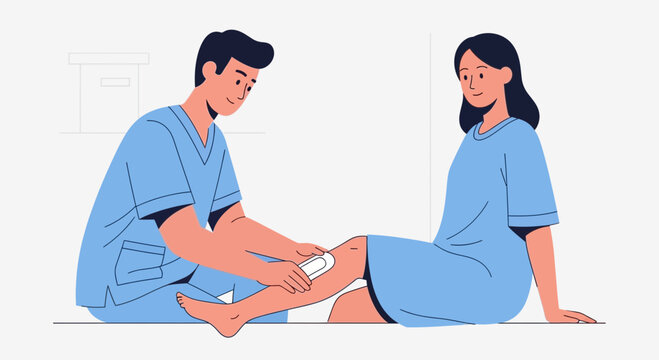 Healthcare Professional Applying Bandage to Patient's Leg in Clinic