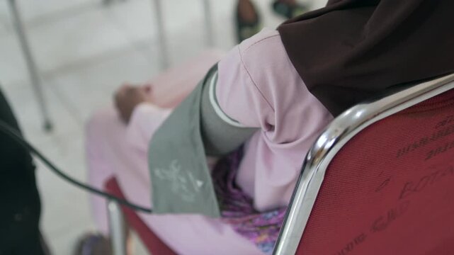 medical staff who are conducting a health check on a patient