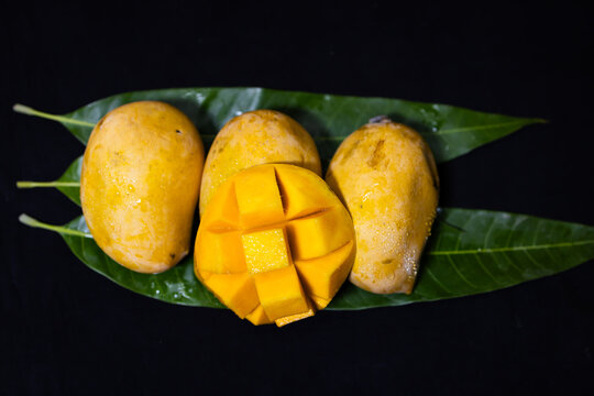 close up of ripe hapus mango cubes with juicy texture and healthy summer fruit appeal