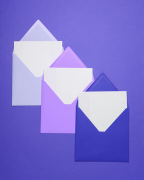 Envelopes with white blank letters on colored background. Creative layout