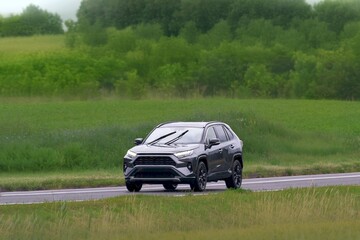 Fototapeta premium Japanese off road vehicle driving in nature
