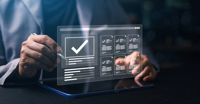 Businessman using digital checklist system for document approval, workflow management and quality control