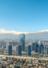Obraz premium Santiago, Chile. Aerial view with the Andes mountain range in the background. Mountain range and snow-capped mountains.
