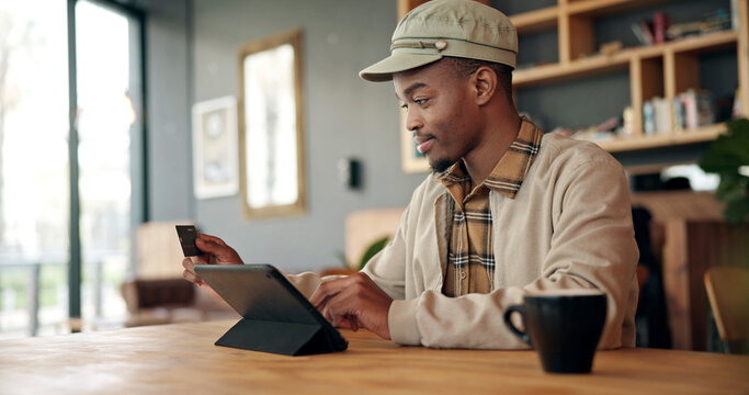 Black man, tablet and credit card for payment in cafe, online banking, shopping or digital purchase. Password, ecommerce and paying with customer or person for financial transaction at coffee shop