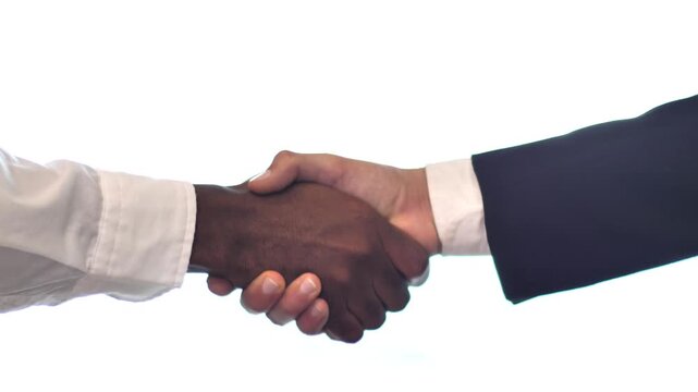 Hands shaking hands during agreement on white background stock footage clip video handshake business deal partnership collaboration people