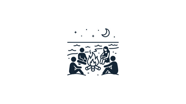 A group of four people sitting around a campfire on the beach at night.