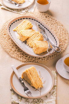 Slice of delicious layered honey cake