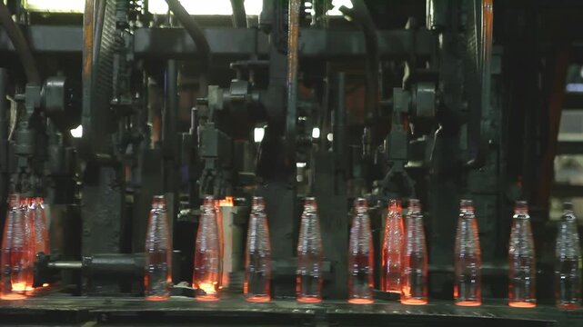 Glassware Manufacturing Process: Heavy Production Line Molding Fiery Bottles