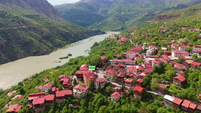 Aerial of Kemaliye town in Turkey nestled along the winding Euphrates River valley travel destination