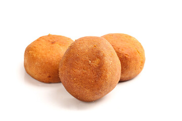 Fototapeta premium Golden Fried Pastry Balls - Traditional Handmade Crispy Snack