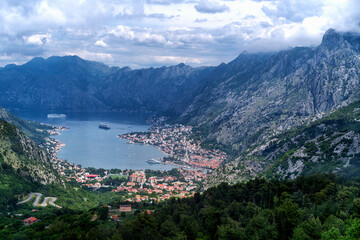 Fototapeta premium Beautiful panoramic view of the Bay of Kotor with mountains and coastal towns in Montenegro.