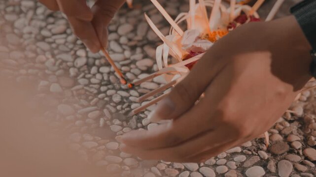 Traditional Way of Lighting Prayer Incense in Bali
