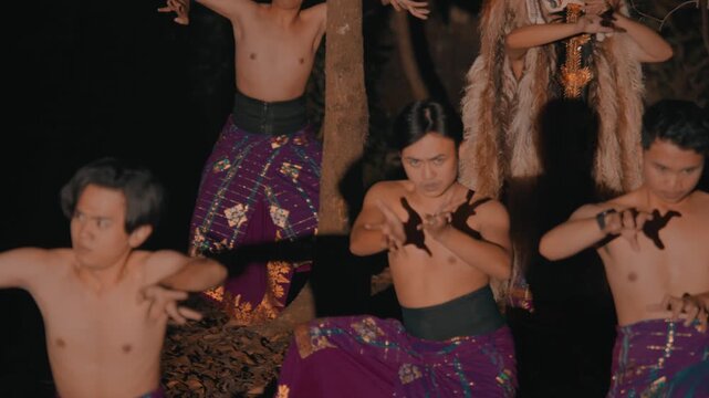 Balinese Men in Action Pose with Mythical Rangda