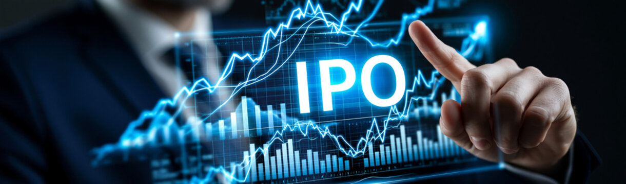 IPO Concept Display: A businessman's hand points to a glowing IPO text overlaid on a dynamic stock market graph, symbolizing financial growth and investment opportunities.