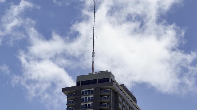 High-rise buildings (Ala Moana Honolulu by Mantra
) and a blue sky with white clouds. Honolulu, Oahu, Hawaii.  