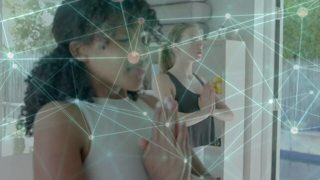 Palms pressing two teens breathing for wellness network overlay drifting across camera closing