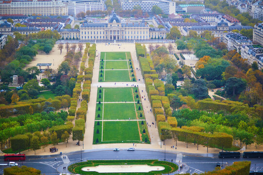 View of the Champ de Mars and Ecole Militaire from the Eiffel Tower in Paris, with formal gardens, autumn trees
