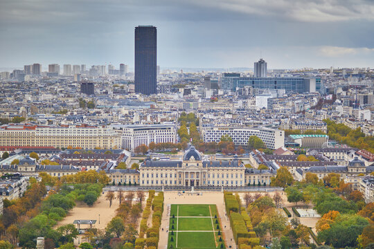 View of the Champ de Mars and Ecole Militaire from the Eiffel Tower in Paris, with autumn trees, Montparnasse Tower