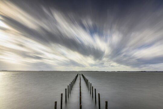 Storm at Lake D&uuml;mmer, jetty, weather, clouds, expanse, long exposure, Lembruch, Lower Saxony, Germany