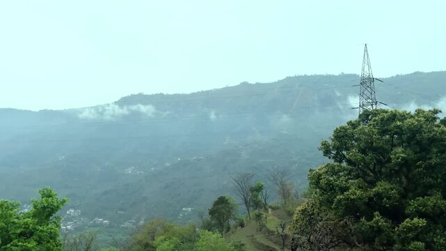 Panaromic view of walking cloud over mountains somewhere nearyby Mandi Distt Near IIT Kamand himachal pradesh india 02