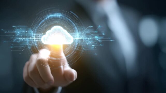 A man in business attire touches a virtual cloud graphic with technology elements in a dark office environment