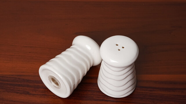 Pair of White Salt and Pepper Shakers