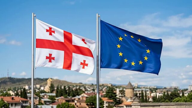 Georgia and European Union Flags Flying Over City Skyline