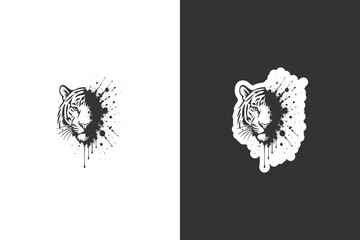 A striking graphic illustration of a tigers face with a dynamic ink splatter effect © DzgnVibe