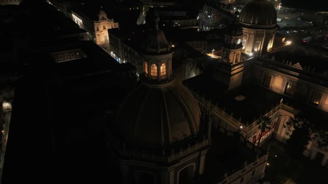 Aerial View Of Catania Cathedral (Basilica Cattedrale Di Sant'agata) And The Chiesa Della Badia Di Sant'agata At Night In Catania, Sicily, Italy.