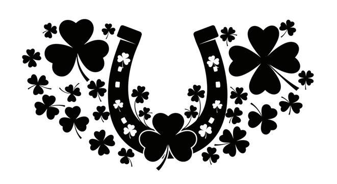 Black horseshoe with four leaf clovers for st patrick's day luck and good fortune symbol